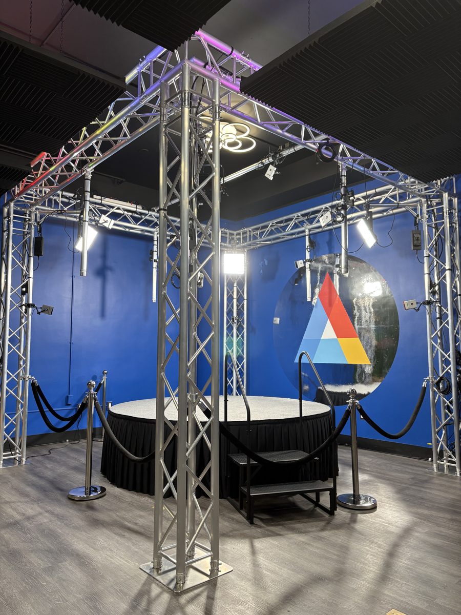 SIC SPACE room with a lighting rig, stage and the S.I.C. logo